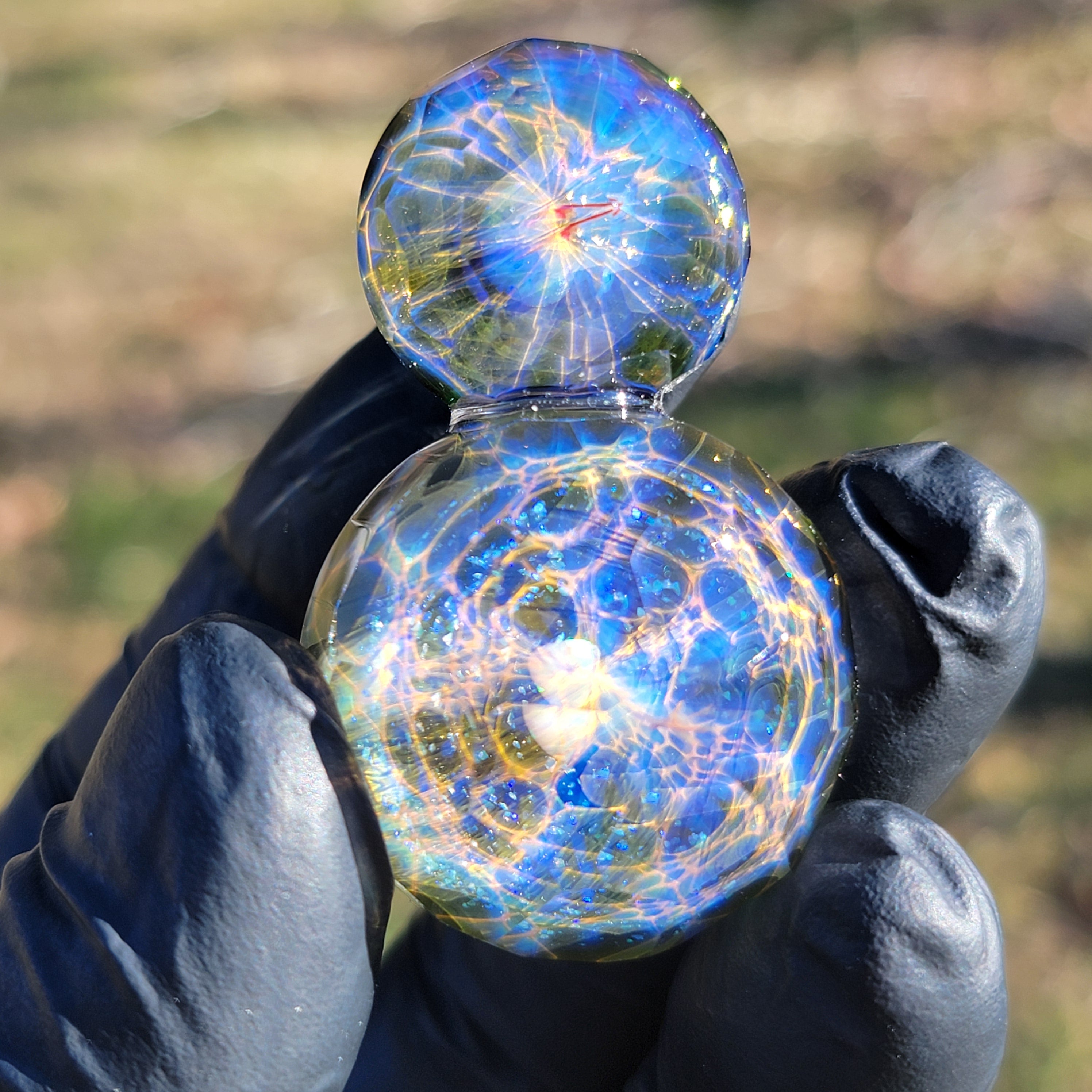 "Sparkling Light Mandala" pendant.